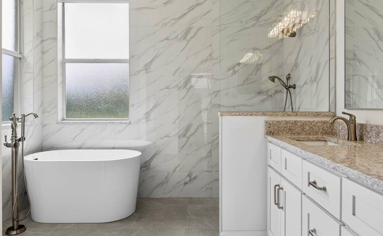 Bathroom remodel with soaking tub, walk-in shower, and stunning wall tile in Odessa, FL