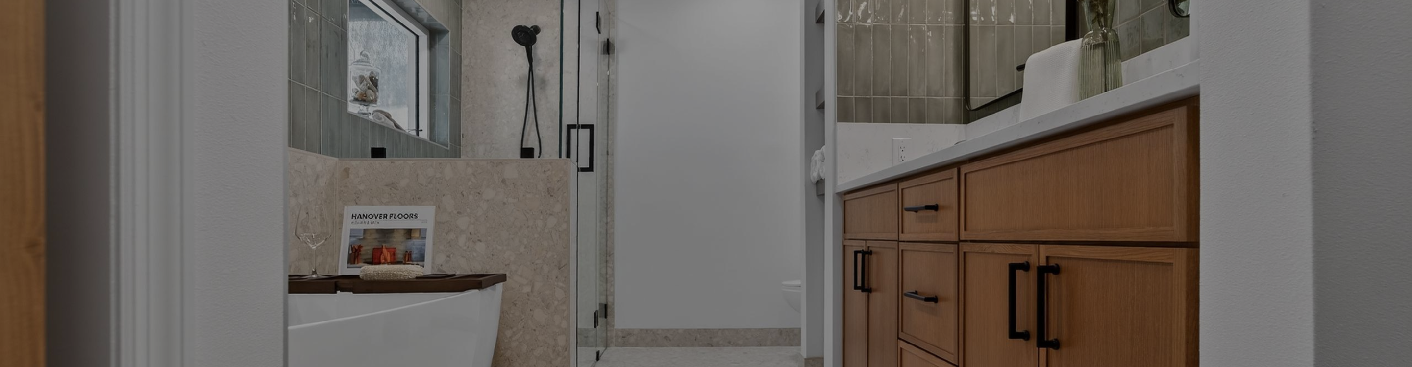 luxurious bathroom remodel with soaking tub, frameless shower door, tub surround with ledge and custom vanity in Tampa, FL