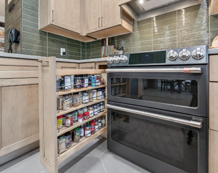 pullout spice rack in a kitchen remodel from Hanover Floors in Tampa, FL