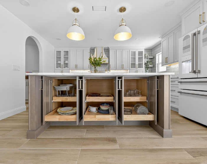 Kitchen island with built-in cabinetry and slide out drawers in Tampa, FL