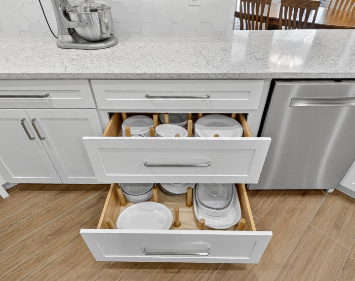 Pull-out drawers in a kitchen remodel with drawers for plates and dishes in Tampa, FL