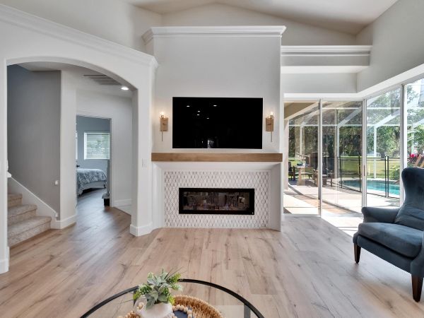 tampa living room with wood floors and fireplace